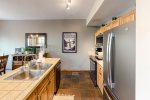 Kitchen with island in this Seasons Townhomes vacation rental